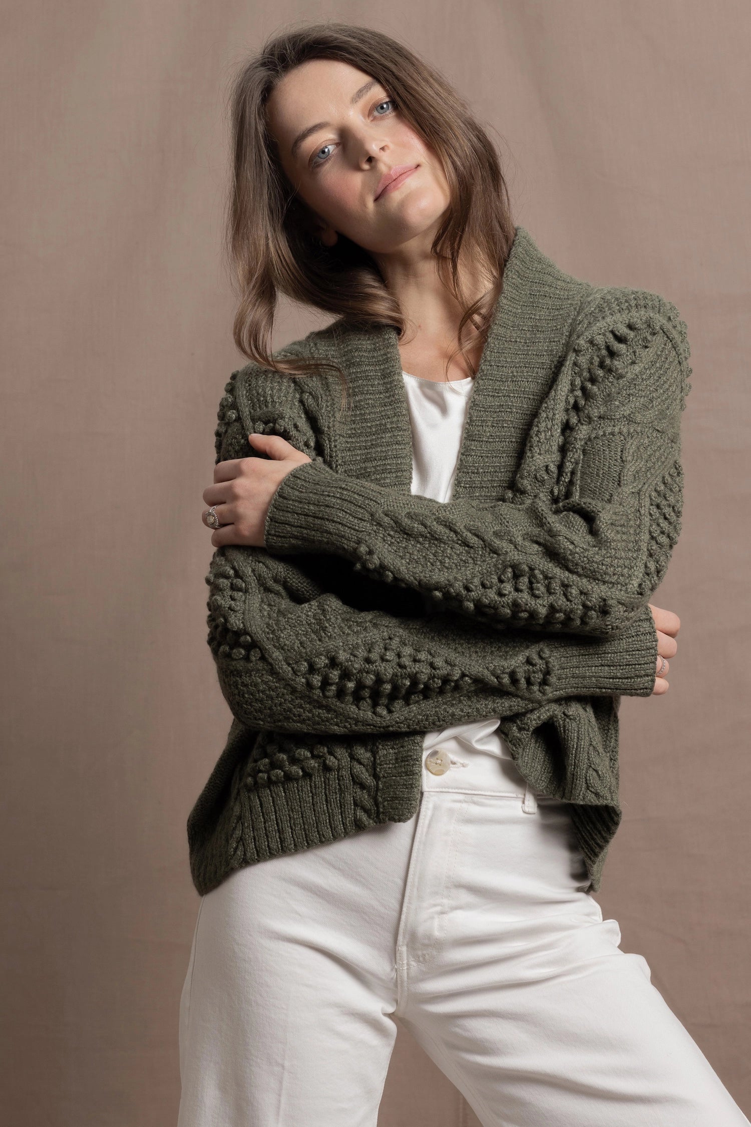 a traditional Irish Cashmere Aran Cardigan Sweater with Blackberry Stitch in Green