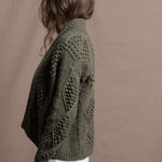 a traditional Irish Cashmere Aran Cardigan Sweater with Blackberry Stitch in Green