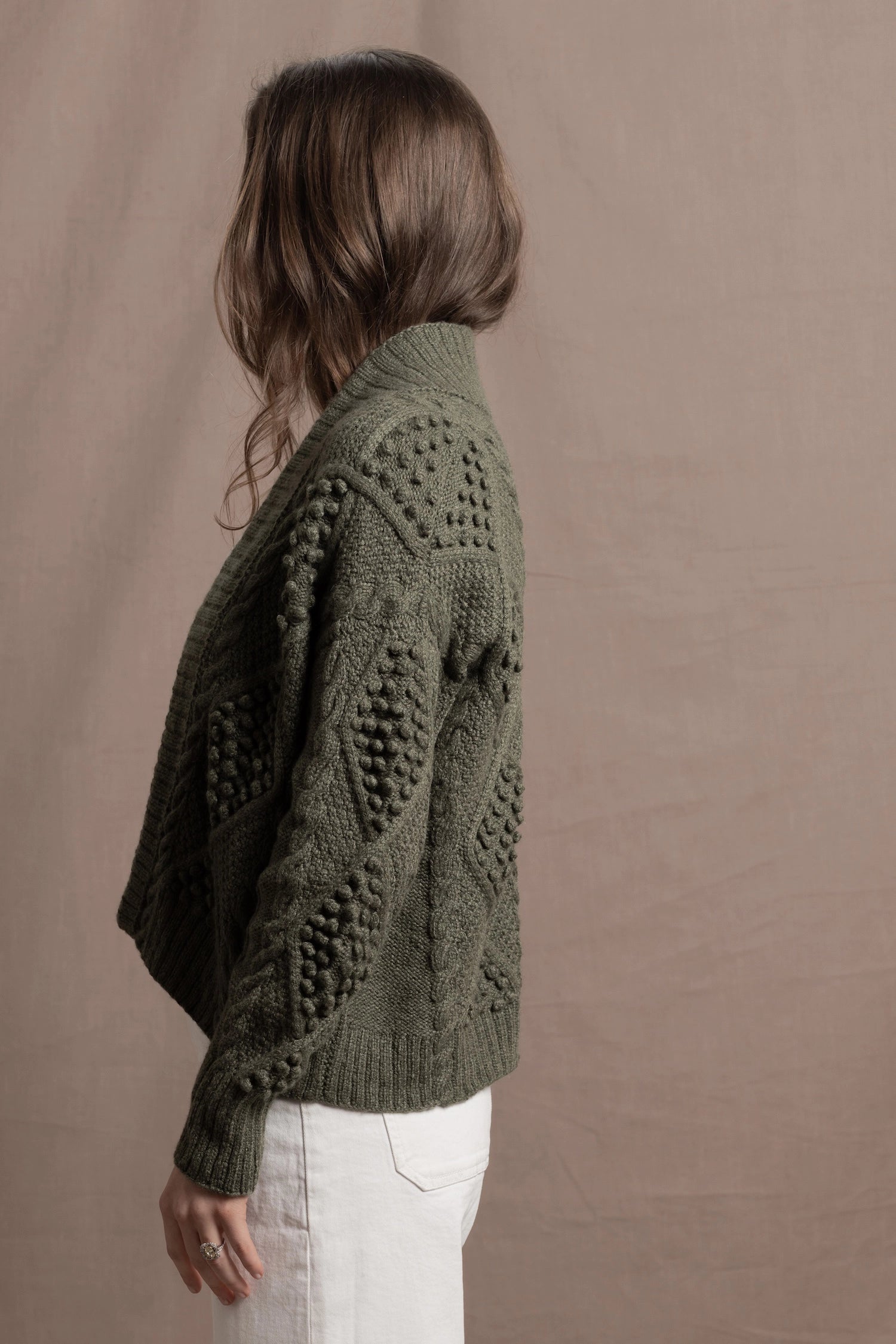 a traditional Irish Cashmere Aran Cardigan Sweater with Blackberry Stitch in Green