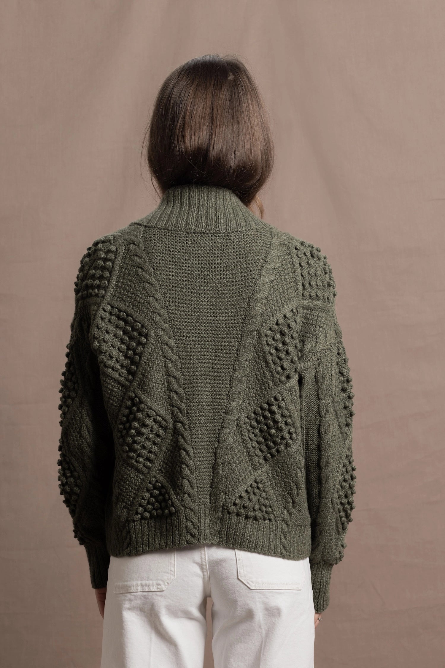 a traditional Irish Cashmere Aran Cardigan Sweater with Blackberry Stitch in Green