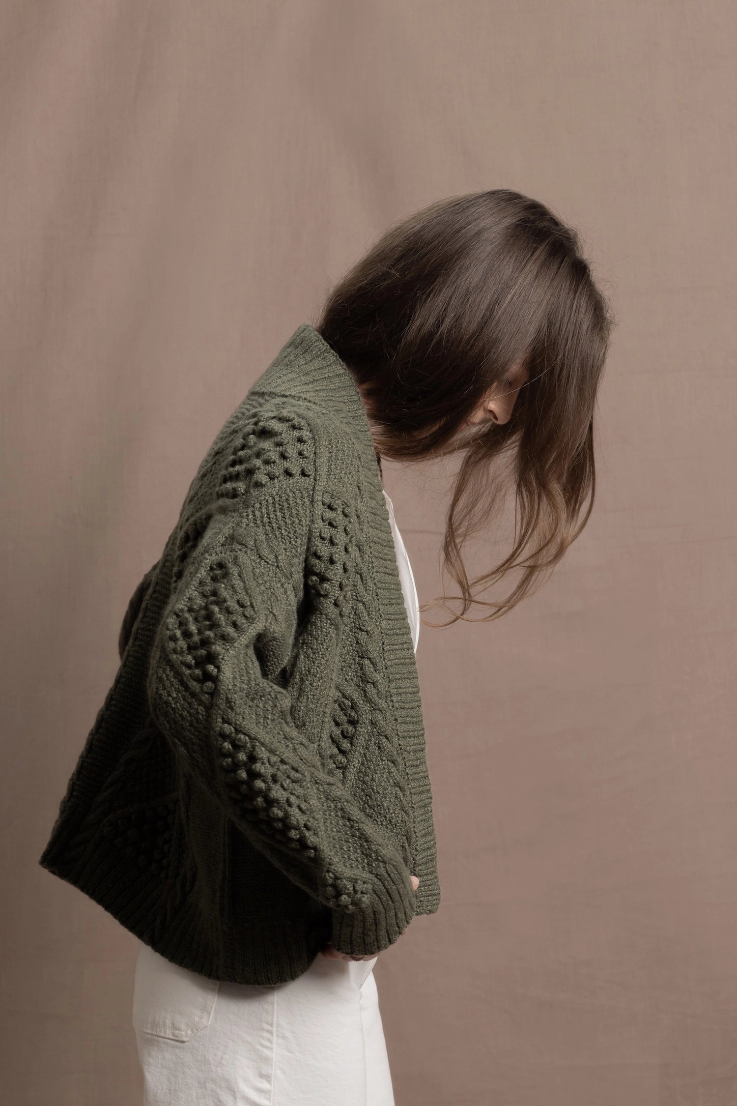 a traditional Irish Cashmere Aran Cardigan Sweater with Blackberry Stitch in Green