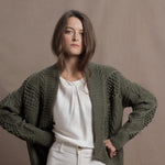 a traditional Irish Cashmere Aran Cardigan Sweater with Blackberry Stitch in Green