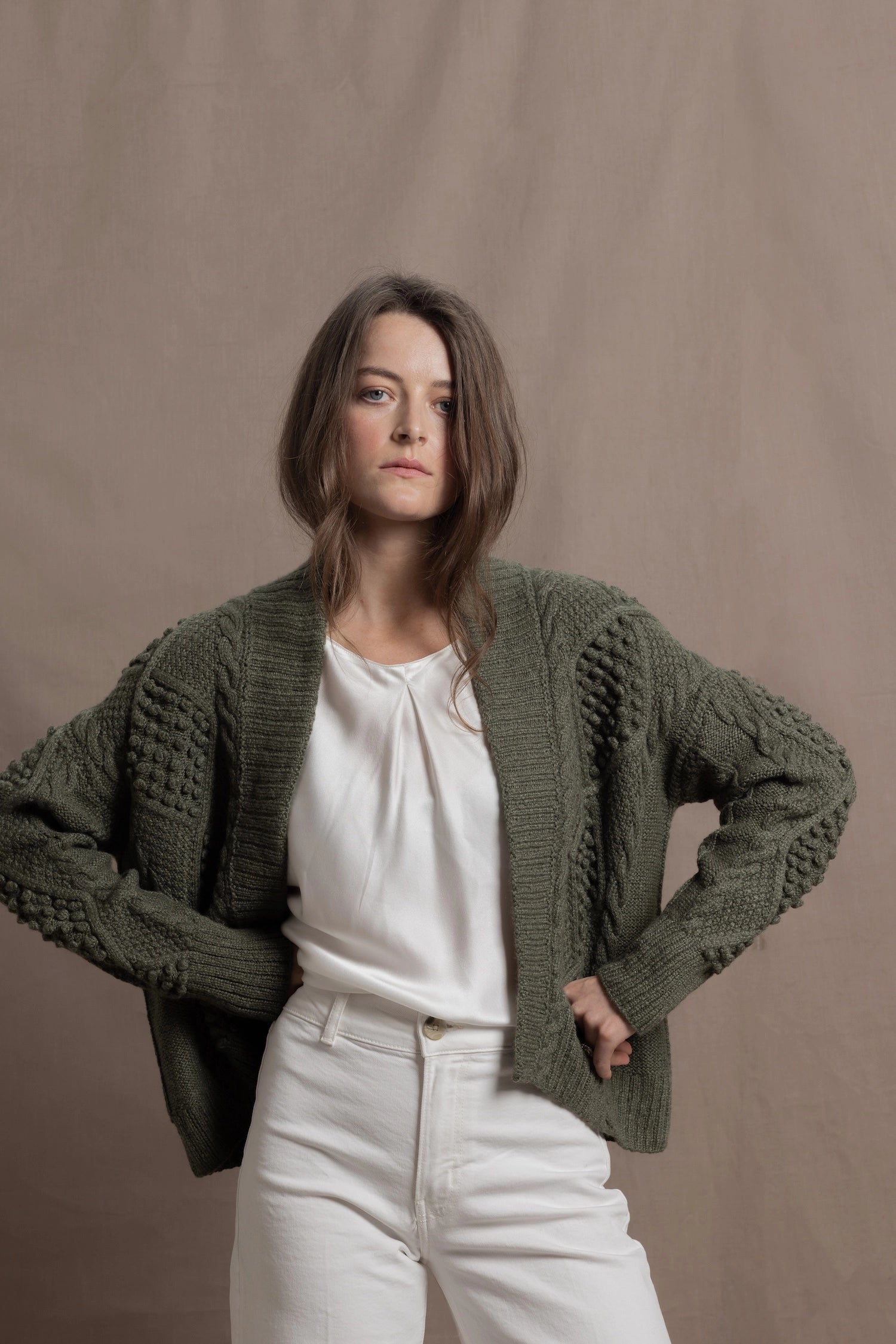 a traditional Irish Cashmere Aran Cardigan Sweater with Blackberry Stitch in Green