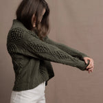 a traditional Irish Cashmere Aran Cardigan Sweater with Blackberry Stitch in Green