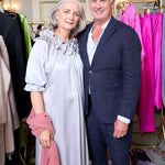 woman with silver silk ruffle dress