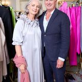 woman with silver silk ruffle dress