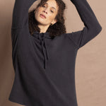 lady wears oversized pure cashmere hoodie sweater in grey blue colour
