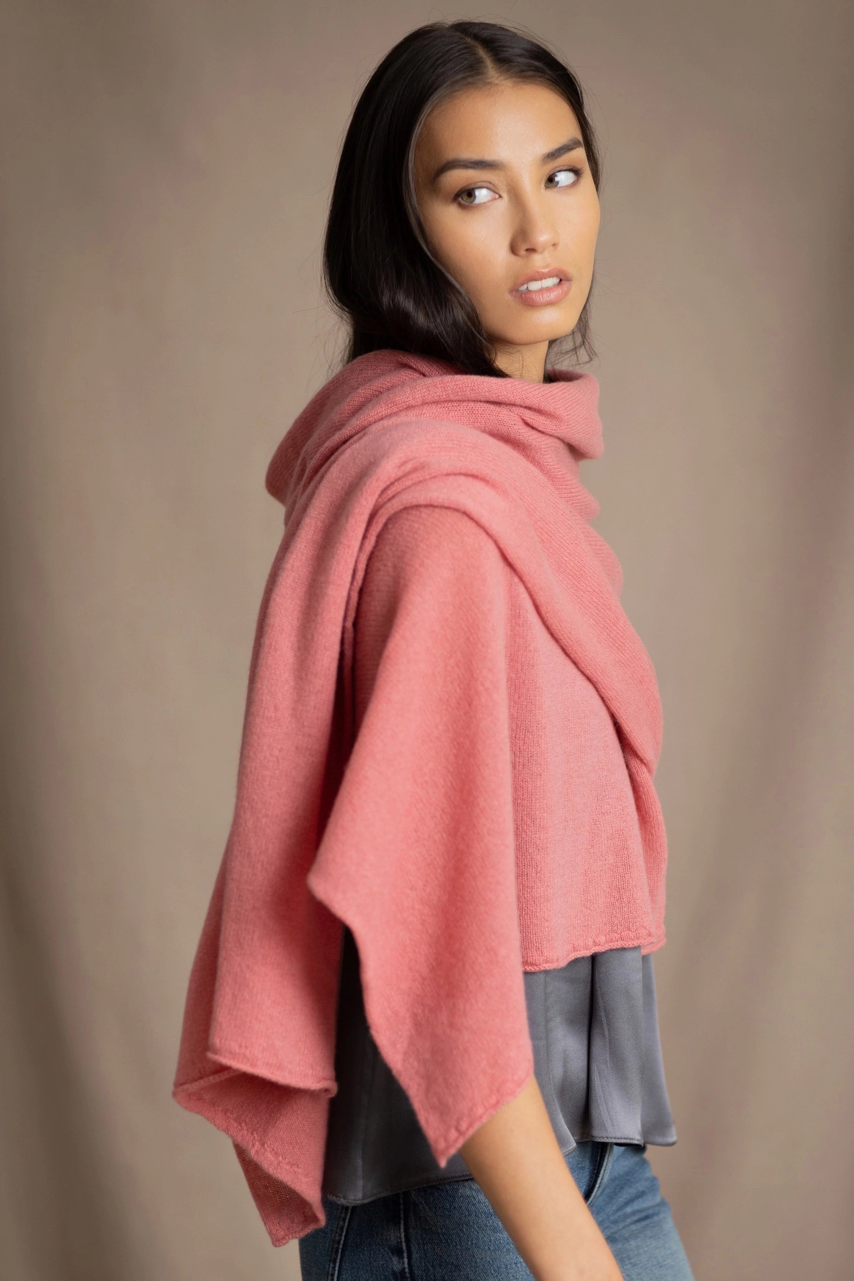 woman wearing large cashmere wrap scarf in rose pink