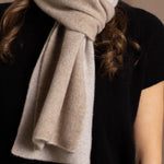 a reversible 100% pure cashmere scarf in beige