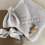 cashmere baby blanket and matching hat with moss stitch in pale grey