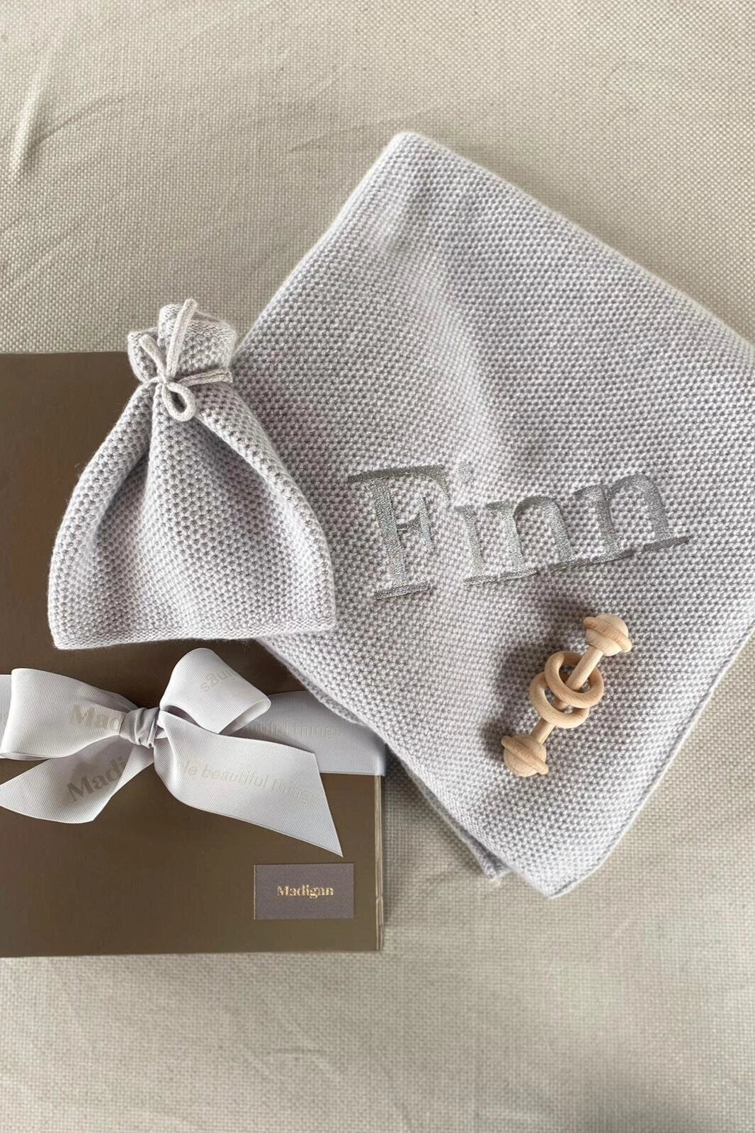 cashmere baby blanket and matching hat with moss stitch in pale grey