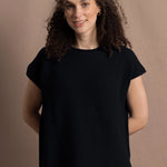 100% Cashmere Tee Sweater in Black worn with bright neon pink silk trousers