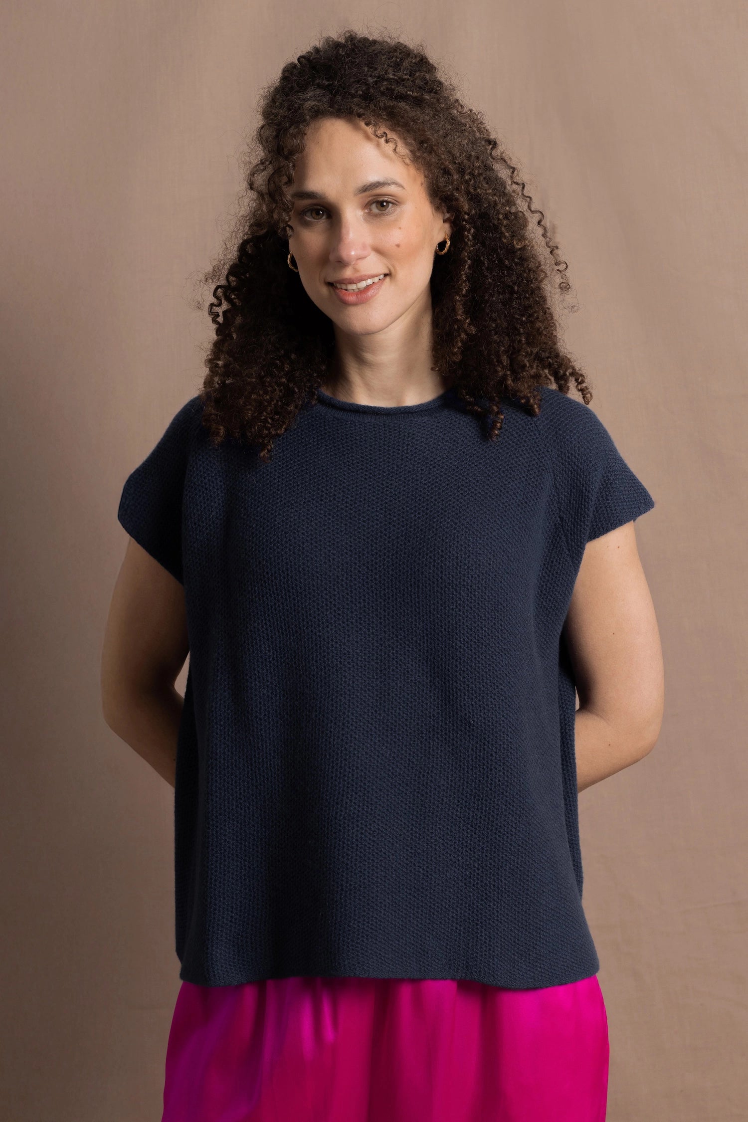 100% Cashmere Tee Sweater in Inky Blue worn with bright neon pink silk trousers