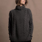 An authentic Irish Cashmere Aran Turtleneck Sweater in Charcoal Grey