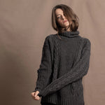 An authentic Irish Cashmere Aran Turtleneck Sweater in Charcoal Grey