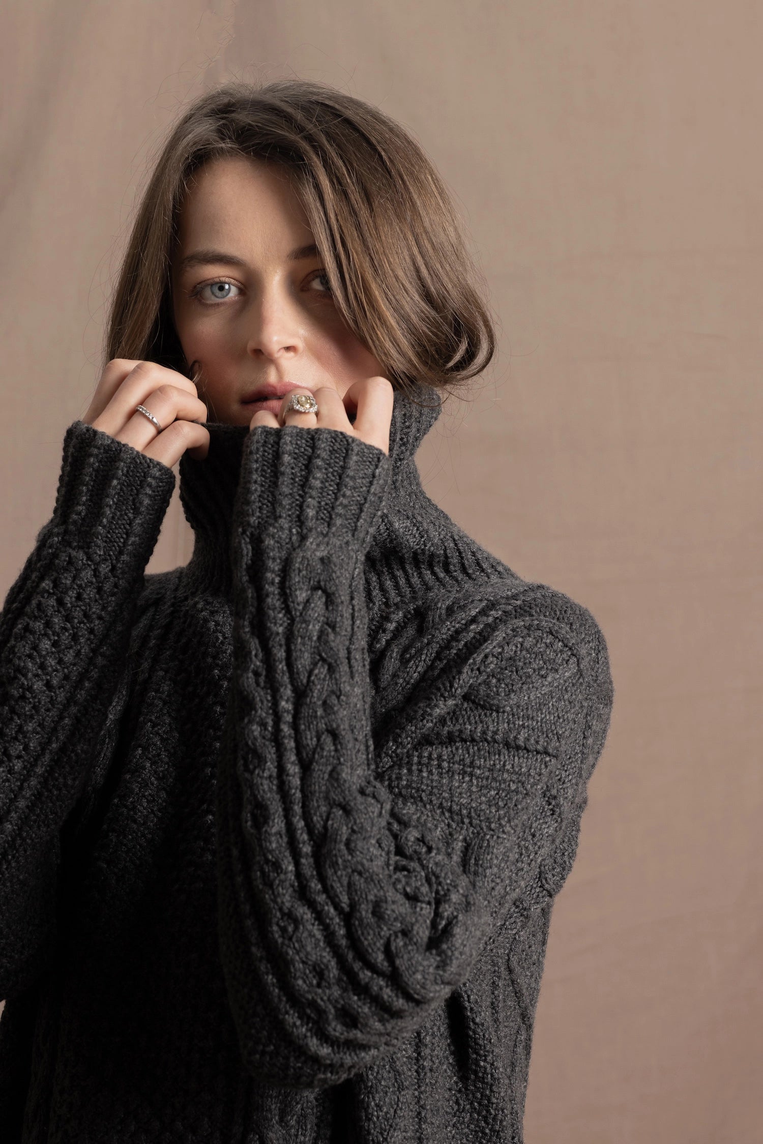 An authentic Irish Cashmere Aran Turtleneck Sweater in Charcoal Grey
