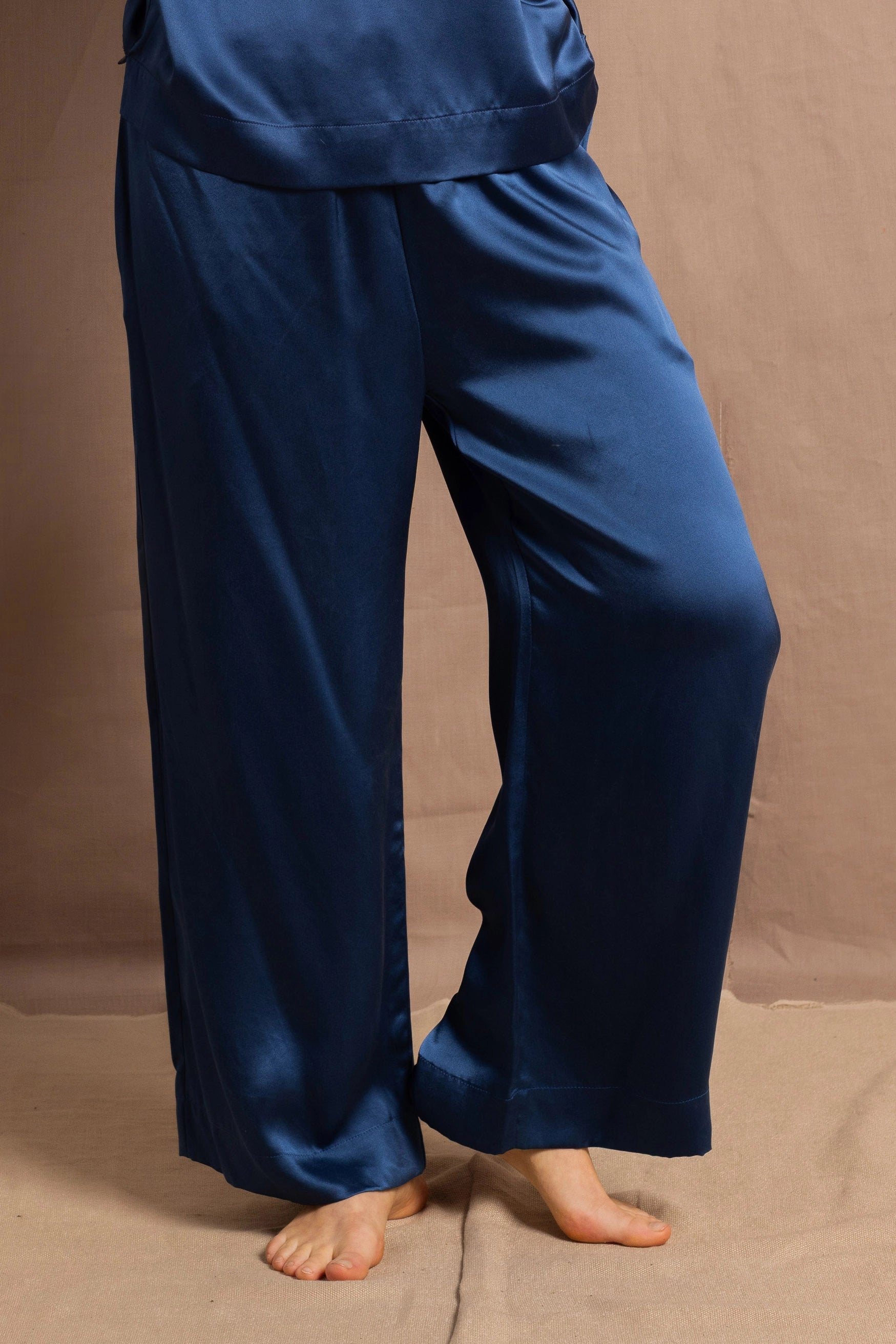 100% pure silk wide trousers in teal blue