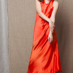 a long pure 100% silk dress in bright orange