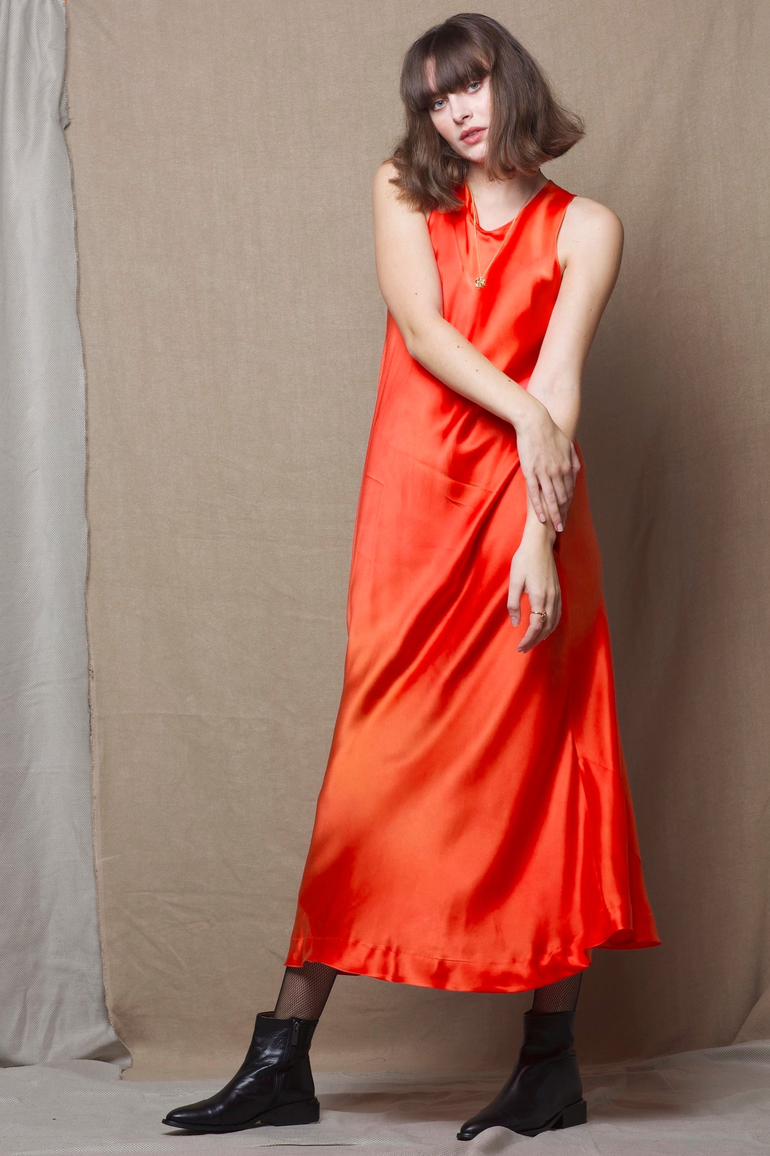 a long pure 100% silk dress in bright orange