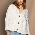 An oversized button down Cashmere Aran Cardigan Sweater in Cream