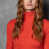 luxury cashmere turtleneck sweater in orange