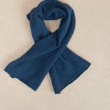 a small teal cashmere scarf