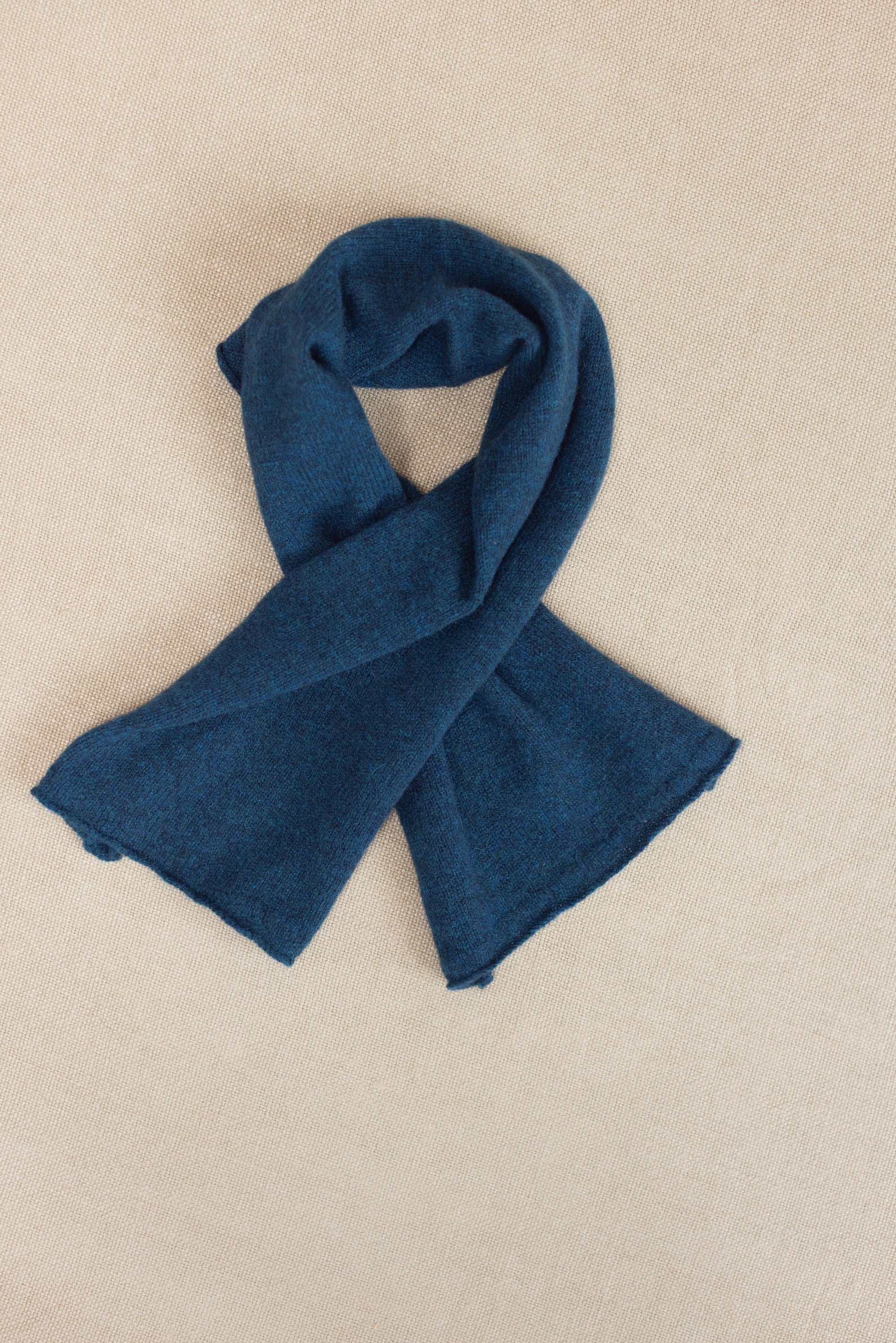 a small teal cashmere scarf