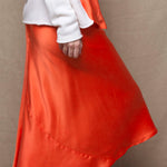 a pure 100% silk midi skirt in bright orange