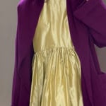 gold silk dress with burgundy cardigan