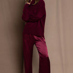 Cashmere turtleneck sweater in wine colour with silk burgundy trousers