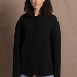 lady wears oversized pure cashmere hoodie sweater in black