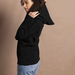 lady wears oversized cashmere hoodie jumper in black