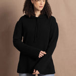 lady wears cashmere hooded sweater in black