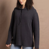 lady wears oversized pure cashmere hoodie sweater in grey blue colour