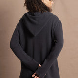 lady wears oversized pure cashmere hoodie sweater in grey blue colour