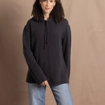 lady wears oversized pure cashmere hoodie sweater in grey blue colour