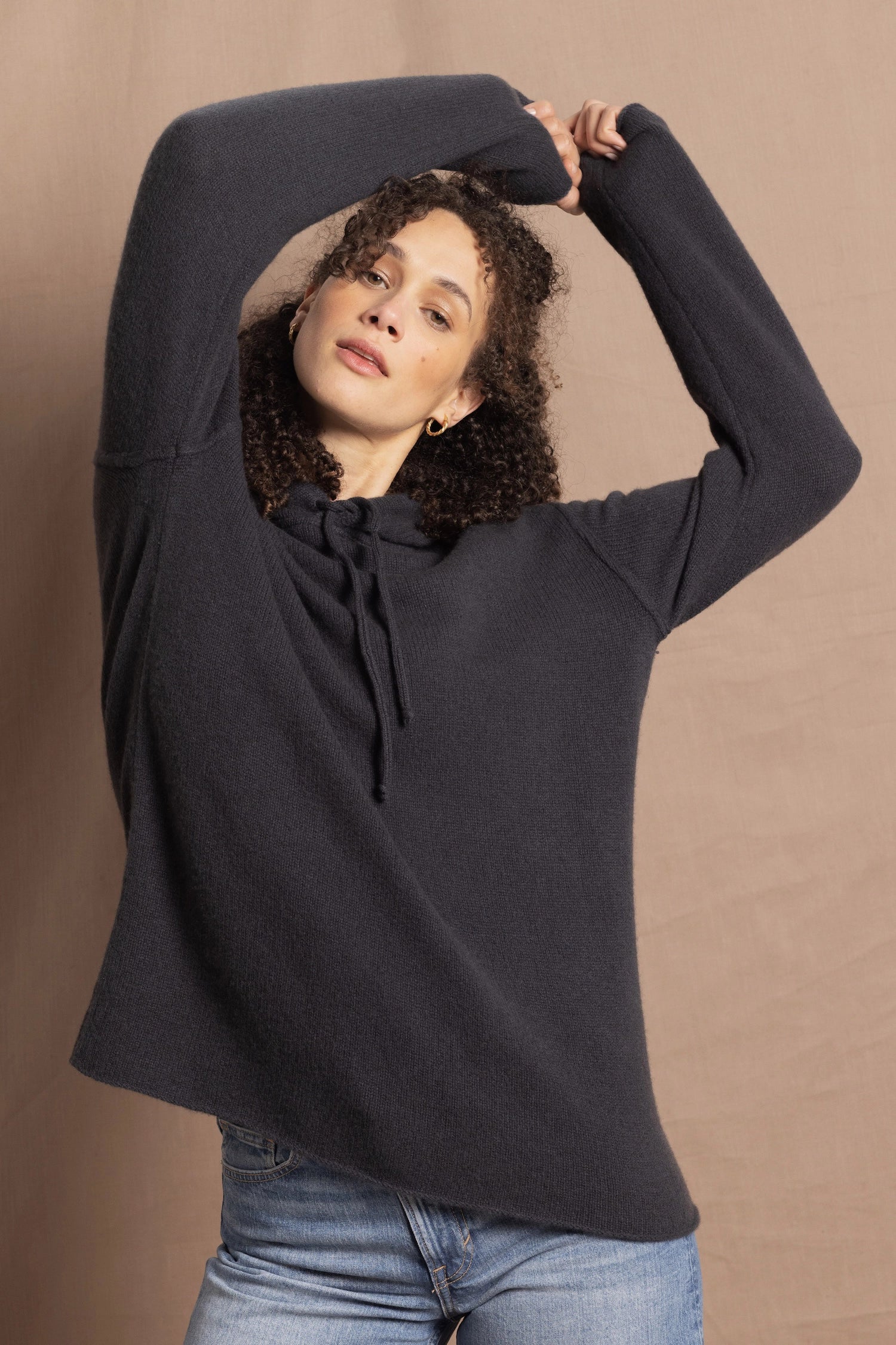 lady wears oversized pure cashmere hoodie sweater in grey blue colour