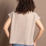 a woman wears pure 100% cashmere tee sweater in beige
