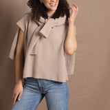 Lady wears luxury cashmere tee sweater in beige with matching beige cashmere cardigan 