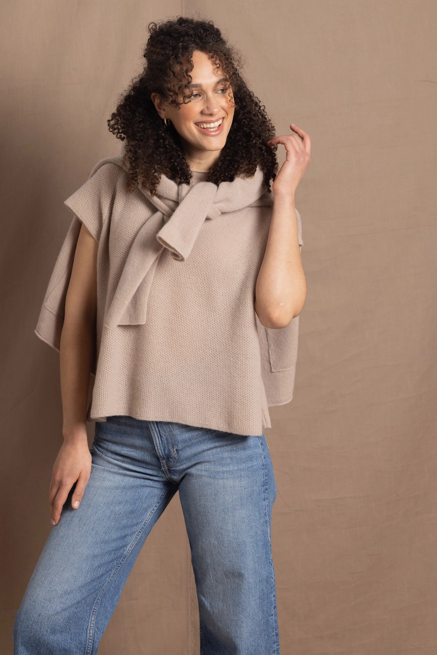 Lady wears luxury cashmere tee sweater in beige with matching beige cashmere cardigan 