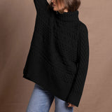 Lady wears pure cashmere aran sweater from Ireland in black
