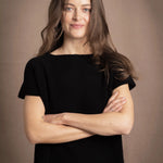 lady standing with 100% cashmere tee short sleeve sweater in black