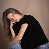 lady standing with 100% cashmere tee short sleeve sweater in black