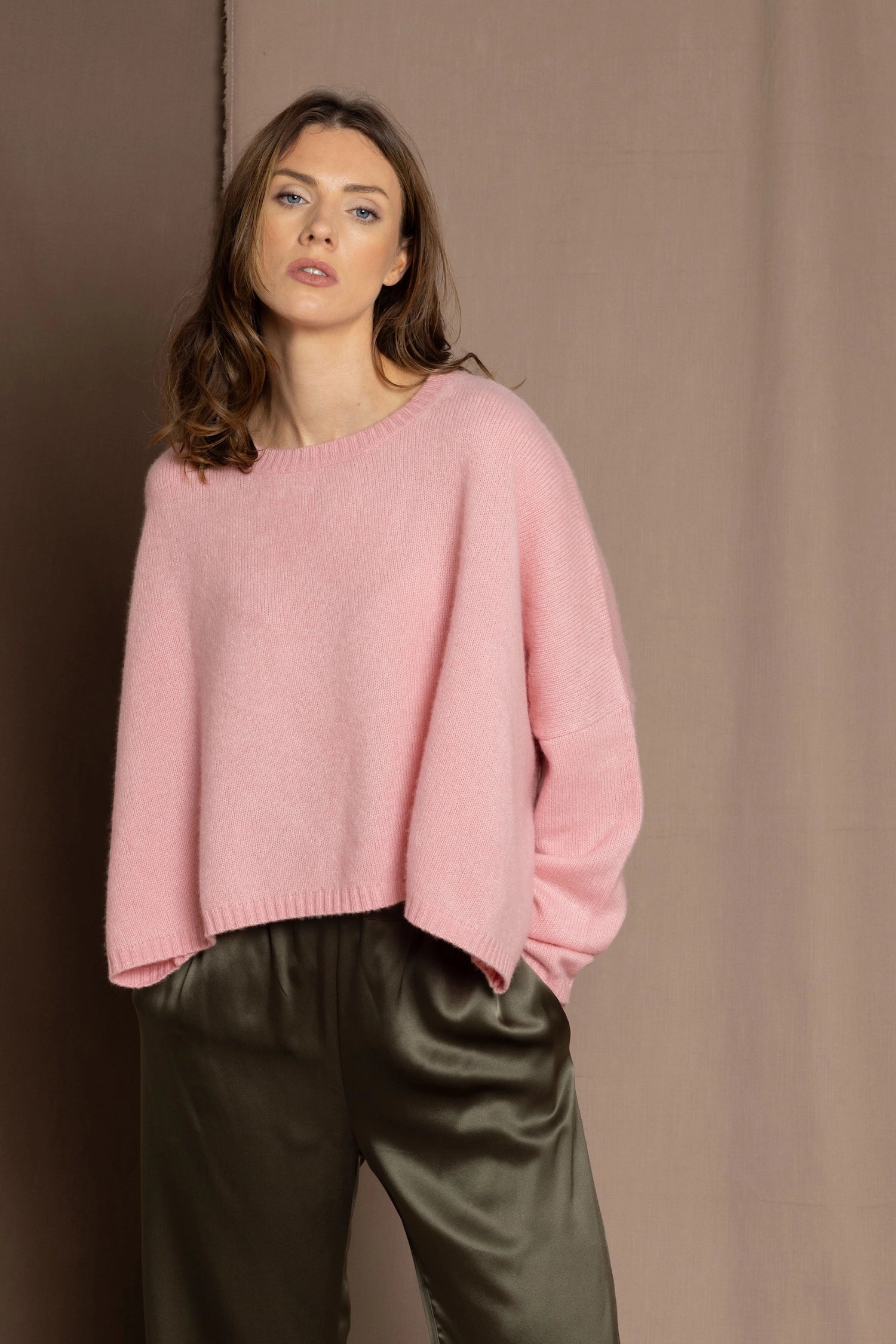 cashmere sweater in pink with green silk trousers