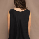 Woman wearing an Irish Linen sleeveless top and skirt  in black