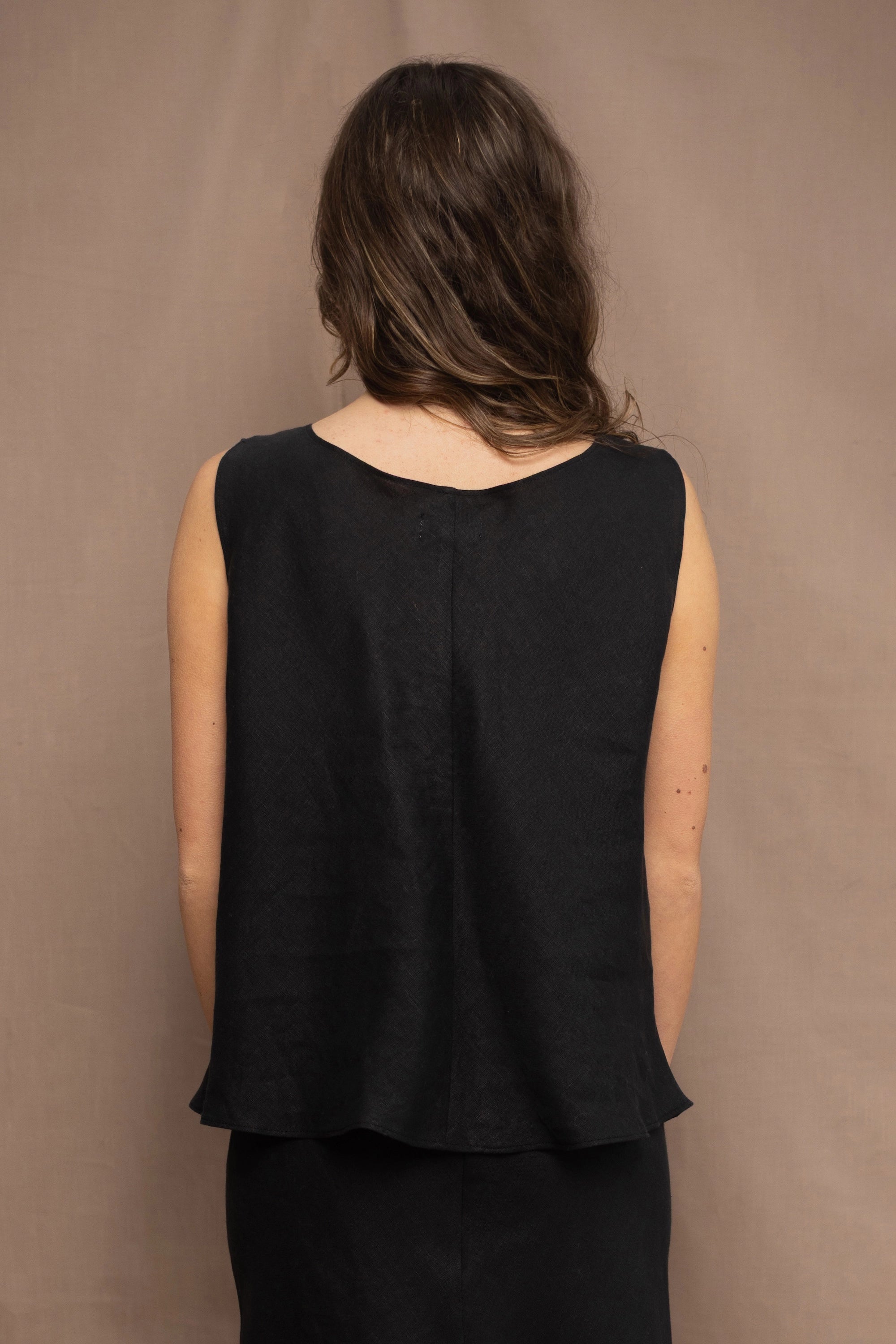 Woman wearing an Irish Linen sleeveless top and skirt  in black