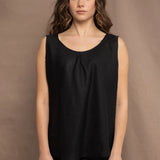 Woman wearing an Irish Linen sleeveless top and skirt  in black