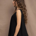 Woman wearing an Irish Linen sleeveless top and skirt  in black