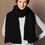 woman wearing a black cashmere scarf wrap 