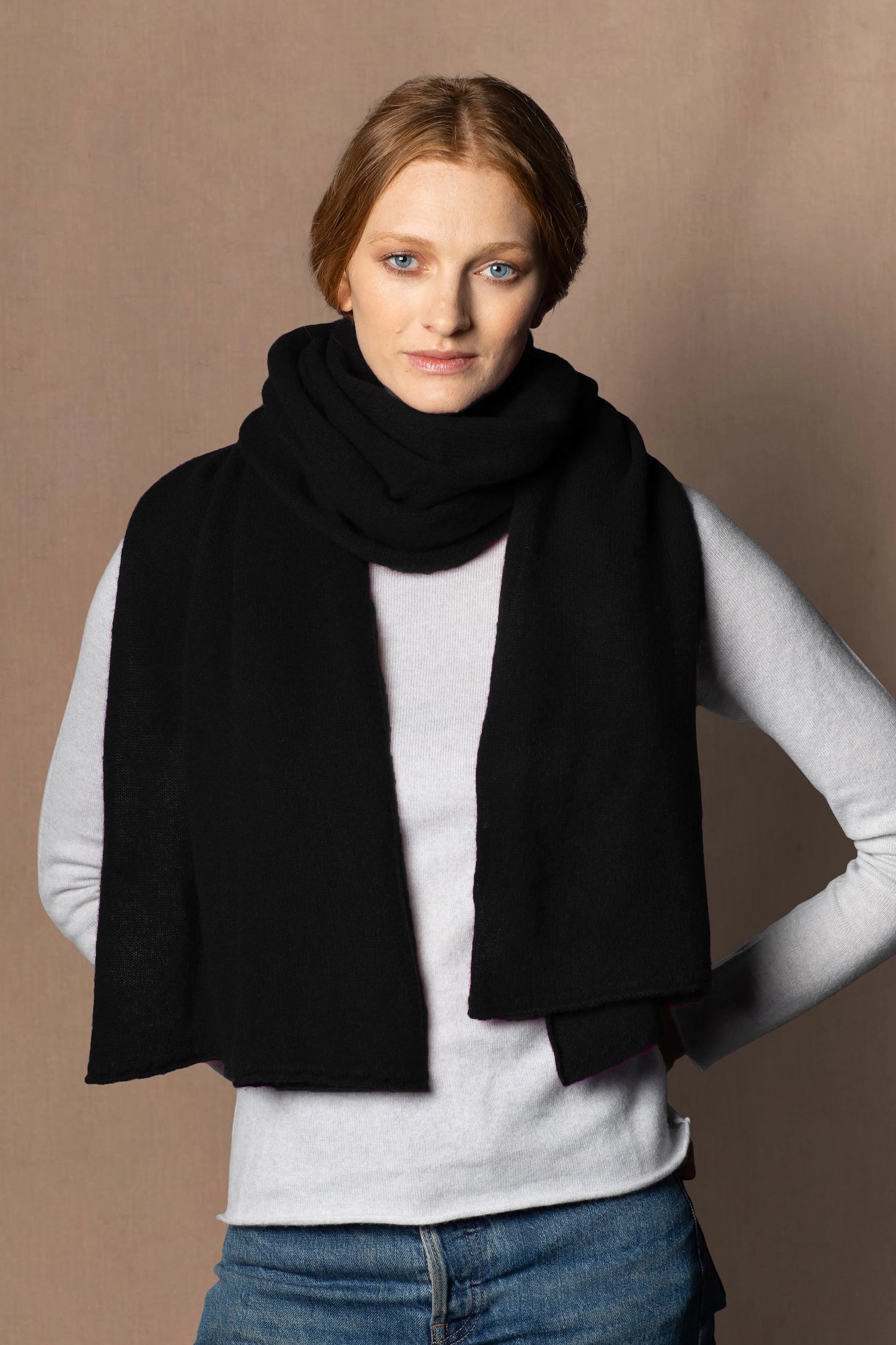 woman wearing a black cashmere scarf wrap 